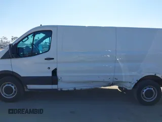 2020 Ford Transit Cargo with VIN 1FTBR1Y83LKA67103, listed as a IAAI auction lot 42408599 with 76,837 mi miles and . Bid and sale history available at DreamBid. Image 14.