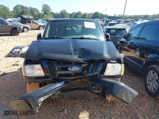 2011 Ford Ranger XLT with VIN 1FTLR4FE5BPA16802, listed as a IAAI auction lot 40502397 with 125,278 mi miles. Bid and sale history available at carsss.com. Image 11.