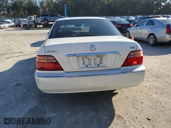 2000 Acura RL with VIN JH4KA9657YC002897, listed as a Copart auction lot 46105305 with 0 mi miles and Salvage Title. Bid and sale history available at carsss.com. Image 6.