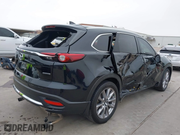2021 Mazda CX-9 Carbon Edition with VIN JM3TCADY8M0529591, listed as a IAAI auction lot 41502174 with 78,630 mi miles. Bid and sale history available at carsss.com. Image 4.