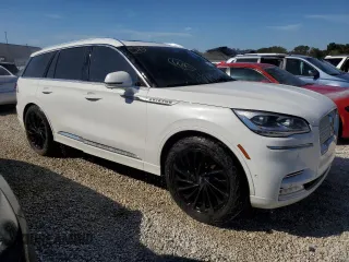 2021 Lincoln Aviator Reserve z VIN 5LM5J7WCXMGL18310, wystawiony jako Copart lot #76247904 z przebiegiem 69 111 mil mil oraz Nie do naprawy • Non repairable. Historia ofert i sprzedaży dostępna na DreamBid. Obrazek 4.