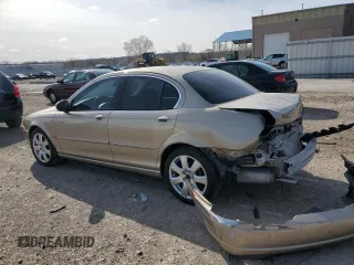 2004 Jaguar X-Type with VIN SAJEA51C64WD66013, listed as a Copart auction lot 50635615 with 47,365 mi miles and Salvage Title. Bid and sale history available at carsss.com. Image 2.