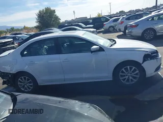 2012 Volkswagen Jetta Sedan SE w/Convenience with VIN 3VWDX7AJ7CM377081, listed as a IAAI auction lot 40756653 with 120,019 mi miles. Bid and sale history available at carsss.com. Image 14.
