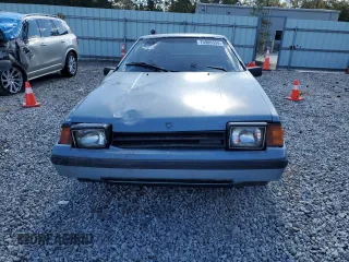 1983 Toyota Celica z VIN JT2RA64L7D6174381, wystawiony jako Copart lot #75986554 z przebiegiem 312 583 mil mil oraz Szkoda całkowita • Salvage title. Historia ofert i sprzedaży dostępna na DreamBid. Obrazek 5.