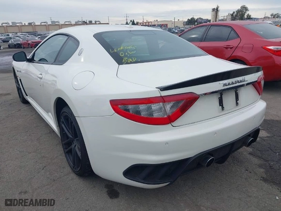 2012 Maserati GranTurismo MC Stradale with VIN ZAM45MLA9C0065671, listed as a IAAI auction lot 40990883 with 27,041 mi miles. Bid and sale history available at carsss.com. Image 3.