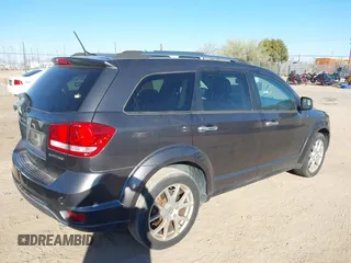 2014 Dodge Journey Limited with VIN 3C4PDDDG2ET175023, listed as a IAAI auction lot 41646669 with 112,663 mi miles and . Bid and sale history available at carsss.com. Image 4.