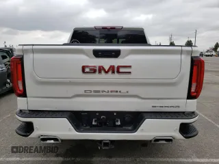 2022 GMC Sierra 1500 with VIN 3GTUUGETXNG640009, listed as a Copart auction lot 56219405 with 43,537 mi miles and Salvage Title. Bid and sale history available at DreamBid. Image 6.