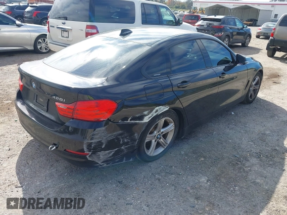 2015 BMW 4 Series 428i z VIN WBA4A9C58FGL85170, wystawiony jako IAAI lot #41362595 z przebiegiem 172 509 mil mil oraz . Historia ofert i sprzedaży dostępna na DreamBid. Obrazek 4.
