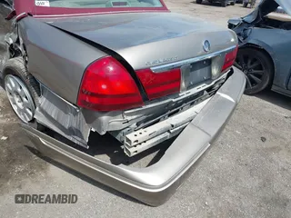 2004 Mercury Grand Marquis LS Premium z VIN 2MEFM75W34X674542, wystawiony jako IAAI lot #42018186 z przebiegiem 137 944 mil mil oraz . Historia ofert i sprzedaży dostępna na DreamBid. Obrazek 12.
