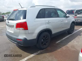 2011 Kia Sorento LX with VIN 5XYKT4A14BG074310, listed as a IAAI auction lot 42119815 with 215,660 mi miles. Bid and sale history available at carsss.com. Image 4.
