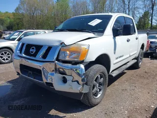 2014 Nissan Titan S with VIN 1N6AA0EC3EN502951, listed as a IAAI auction lot 41956309 with 128,464 mi miles and . Bid and sale history available at DreamBid. Image 17.