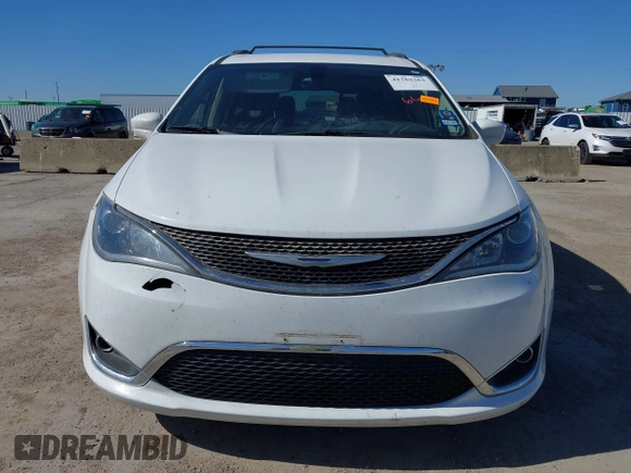 2018 Chrysler Pacifica Touring L with VIN 2C4RC1BG1JR119682, listed as a IAAI auction lot 41762362 with 167,380 mi miles and . Bid and sale history available at DreamBid. Image 12.