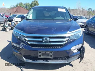 2017 Honda Pilot Touring with VIN 5FNYF6H98HB020341, listed as a IAAI auction lot 42037156 with 73,511 mi miles and . Bid and sale history available at DreamBid. Image 12.