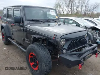 2014 Jeep Wrangler Unlimited Sport with VIN 1C4BJWDG6EL239378, listed as a IAAI auction lot 42073392 with 120,999 mi miles. Bid and sale history available at carsss.com. Image 1.