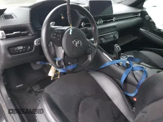 2022 Toyota GR Supra 2.0 with VIN WZ1DB2C09NW048380, listed as a Copart auction lot 87413024 with 0 mi miles and Salvage Title. Bid and sale history available at carsss.com. Image 8.