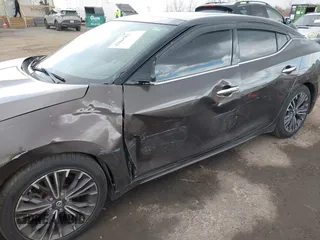 2016 Nissan Maxima SV with VIN 1N4AA6AP0GC904168, listed as a IAAI auction lot 41865822 with 121,999 mi miles and . Bid and sale history available at DreamBid. Image 6.