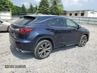 2018 Lexus RX 350 with VIN 2T2BZMCA6JC149235, listed as a Copart auction lot 59939505 with 214,676 mi miles and Salvage title. Bid and sale history available at DreamBid. Image 3.