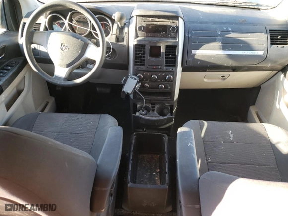 2009 Dodge Grand Caravan SE with VIN 2D8HN44E89R693888, listed as a Copart auction lot 78032924 with 124,045 mi miles and Salvage Title. Bid and sale history available at carsss.com. Image 8.