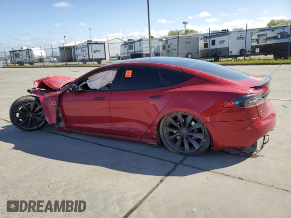 2016 Tesla Model S 90D with VIN 5YJSA1E44GF162393, listed as a Copart auction lot 51708825 with 173,880 mi miles and Salvage title. Bid and sale history available at DreamBid. Image 2.