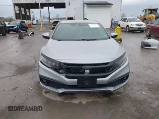 2019 Honda Civic Sport with VIN 19XFC2F81KE034047, listed as a IAAI auction lot 41995614 with 91,303 mi miles and . Bid and sale history available at DreamBid. Image 13.