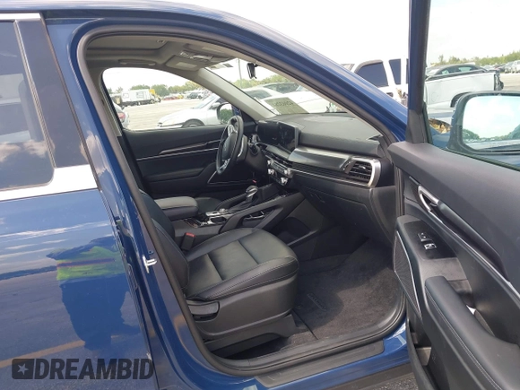 2025 Kia Telluride S with VIN 5XYP64GC0SG581646, listed as a IAAI auction lot 42063284 with 12,561 mi miles and . Bid and sale history available at DreamBid. Image 5.