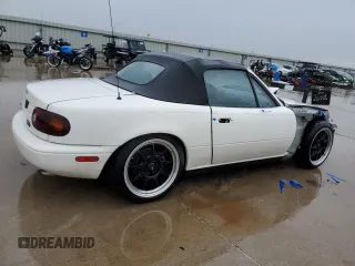 1994 Mazda MX-5 Miata with VIN JM1NA353XR0502129, listed as a Copart auction lot 42827275 with Not provided miles and Salvage title. Bid and sale history available at DreamBid. Image 3.