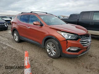 2017 Hyundai Santa Fe 2.0T с VIN 5XYZUDLAXHG471408, выставлен на аукционе Copart как лот 45493115 с пробегом 227 867 миль миль и Списание • Salvage title. История ставок и продаж доступна на DreamBid. Изображение 4.