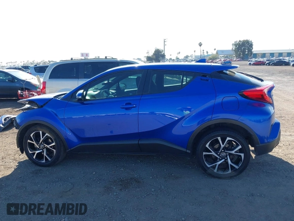 2018 Toyota C-HR XLE z VIN NMTKHMBXXJR007134, wystawiony jako IAAI lot #42004283 z przebiegiem 174 336 mil mil oraz . Historia ofert i sprzedaży dostępna na DreamBid. Obrazek 15.