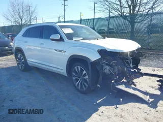 2022 Volkswagen Atlas SEL Premium R-Line with VIN 1V2FE2CA3NC207630, listed as a IAAI auction lot 41741177 with 28,707 mi miles and . Bid and sale history available at DreamBid. Image 1.