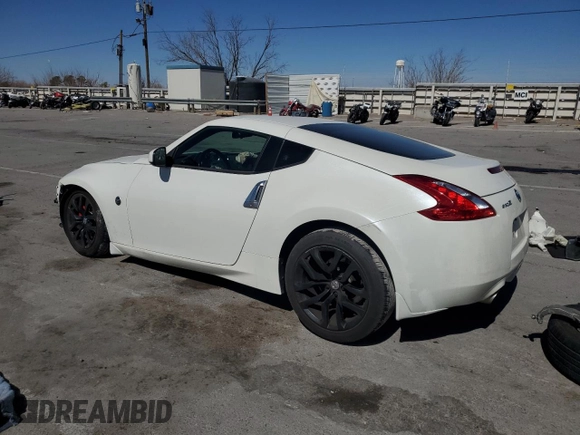 2014 Nissan 370Z Nismo with VIN JN1AZ4EH2EM633022, listed as a Copart auction lot 46947575 with 115,042 mi miles and Salvage Title. Bid and sale history available at DreamBid. Image 2.