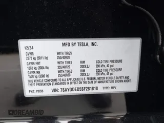 2025 Tesla Model Y Long Range with VIN 7SAYGDED5SF281818, listed as a IAAI auction lot 41302611 with 395 mi miles and . Bid and sale history available at DreamBid. Image 9.