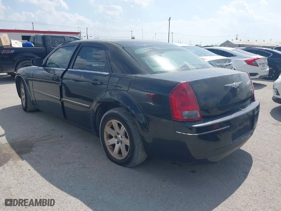 2006 Chrysler 300 Touring with VIN 2C3KA53G66H212129, listed as a IAAI auction lot 41868973 with 248,340 mi miles. Bid and sale history available at carsss.com. Image 3.