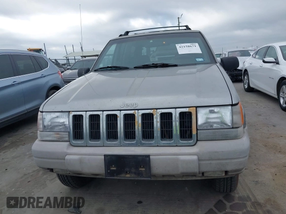 1998 Jeep Grand Cherokee Laredo with VIN 1J4FX58S6WC354101, listed as a IAAI auction lot 42158671 with 289,318 mi miles and . Bid and sale history available at DreamBid. Image 6.