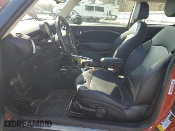 2011 MINI Hardtop S with VIN WMWSV3C57BTY11831, listed as a Copart auction lot 51985845 with 70,690 mi miles and Salvage Title. Bid and sale history available at DreamBid. Image 7.