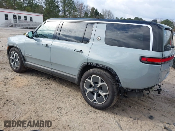 2024 Rivian R1S Adventure with VIN 7PDSGBBA1RN040036, listed as a IAAI auction lot 41694635 with 13,855 mi miles. Bid and sale history available at carsss.com. Image 3.