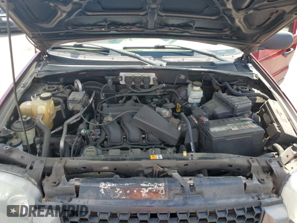 2006 Ford Escape XLT z VIN 1FMCU93136KA12761, wystawiony jako Copart lot #65526955 z przebiegiem 142 075 mil mil oraz Szkoda całkowita • Salvage title. Historia ofert i sprzedaży dostępna na DreamBid. Obrazek 12.