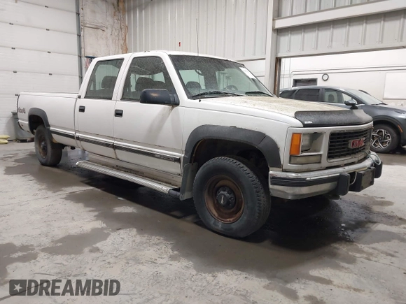 1997 GMC Sierra 3500 z VIN 1GTHK33F4VF004765, wystawiony jako IAAI lot #42053137 z przebiegiem 129 249 mil mil oraz . Historia ofert i sprzedaży dostępna na DreamBid. Obrazek 1.