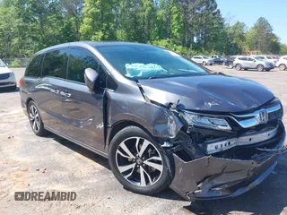 2018 Honda Odyssey Elite z VIN 5FNRL6H97JB072241, wystawiony jako IAAI lot #42006971 z przebiegiem 123 303 mil mil oraz . Historia ofert i sprzedaży dostępna na DreamBid. Obrazek 1.