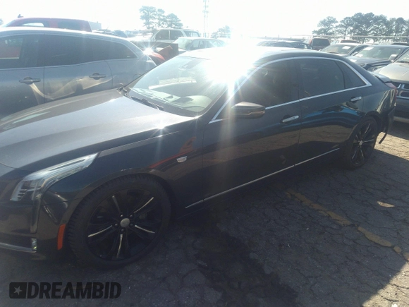 2016 Cadillac CT6 Platinum AWD with VIN 1G6KK5R68GU151651, listed as a IAAI auction lot 41527079 with 89,139 mi miles and . Bid and sale history available at DreamBid. Image 2.