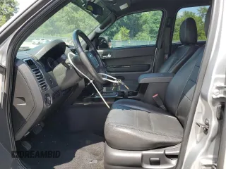 2010 Ford Escape Limited with VIN 1FMCU0E77AKC58458, listed as a Copart auction lot 64207645 with 160,650 mi miles and Salvage title. Bid and sale history available at DreamBid. Image 7.