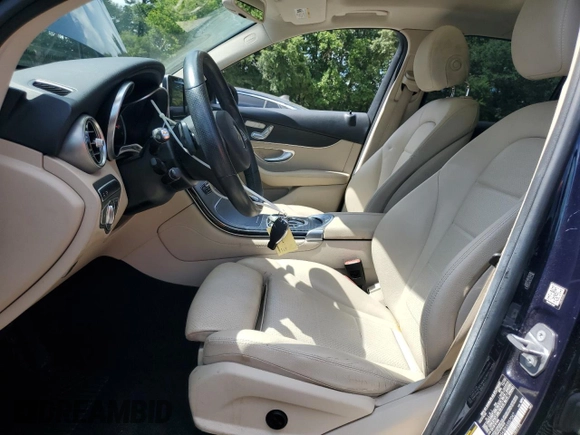 2018 Mercedes-Benz GLC 300 with VIN WDC0G4JBXJV057047, listed as a Copart auction lot 64453315 with 63,320 mi miles and Salvage title. Bid and sale history available at DreamBid. Image 7.