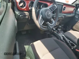 2023 Jeep Wrangler Rubicon с VIN 1C4HJXCG6PW679118, выставлен на аукционе Copart как лот 66469354 с пробегом 5 038 миль миль и Списание • Salvage title. История ставок и продаж доступна на DreamBid. Изображение 8.