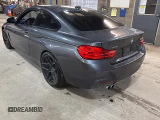 2014 BMW 4 Series 428i xDrive with VIN WBA3N5C56EF716258, listed as a Copart auction lot 52916185 with 106,512 mi miles and Salvage Title. Bid and sale history available at DreamBid. Image 3.