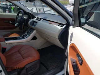 2015 Land Rover Range Rover Evoque Prestige z VIN SALVV2BG4FH076675, wystawiony jako IAAI lot #42138353 z przebiegiem 99 751 mil mil oraz . Historia ofert i sprzedaży dostępna na DreamBid. Obrazek 5.