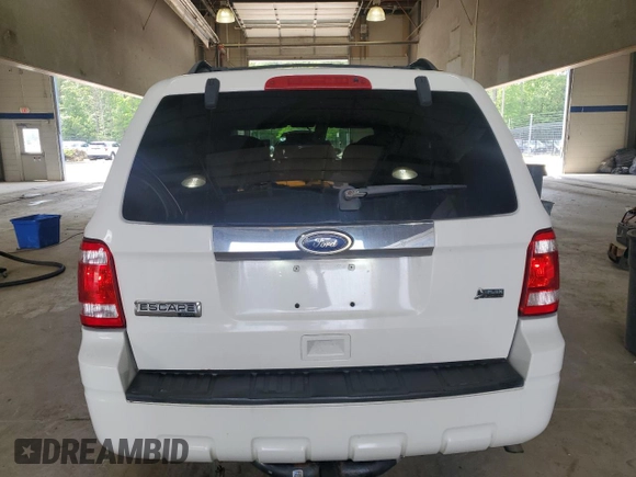 2010 Ford Escape Limited z VIN 1FMCU9EG4AKC43050, wystawiony jako Copart lot #60251495 z przebiegiem 174 550 mil mil oraz Szkoda całkowita • Salvage title. Historia ofert i sprzedaży dostępna na DreamBid. Obrazek 6.