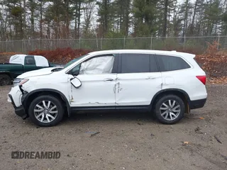 2022 Honda Pilot EX-L with VIN 5FNYF6H54NB020832, listed as a IAAI auction lot 40916277 with 58,441 mi miles. Bid and sale history available at carsss.com. Image 15.