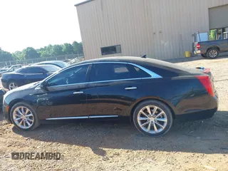 2014 Cadillac XTS Luxury z VIN 2G61M5S30E9229758, wystawiony jako IAAI lot #42179952 z przebiegiem 125 848 mil mil oraz . Historia ofert i sprzedaży dostępna na DreamBid. Obrazek 14.