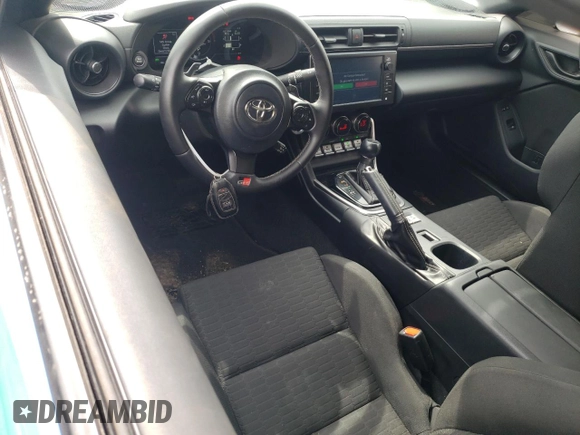 2022 Toyota GR86 with VIN JF1ZNBC10N8752398, listed as a Copart auction lot 57057444 with 32,502 mi miles and Salvage Title. Bid and sale history available at carsss.com. Image 8.