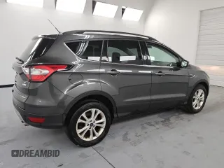 2018 Ford Escape SE with VIN 1FMCU0GD6JUA74555, listed as a Copart auction lot 54448535 with 114,848 mi miles and Clean Title. Bid and sale history available at carsss.com. Image 3.