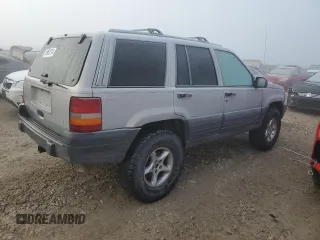 1997 Jeep Grand Cherokee Laredo with VIN 1J4GZ58Y6VC603370, listed as a Copart auction lot 82802794 with 0 mi miles and Salvage Title. Bid and sale history available at carsss.com. Image 3.